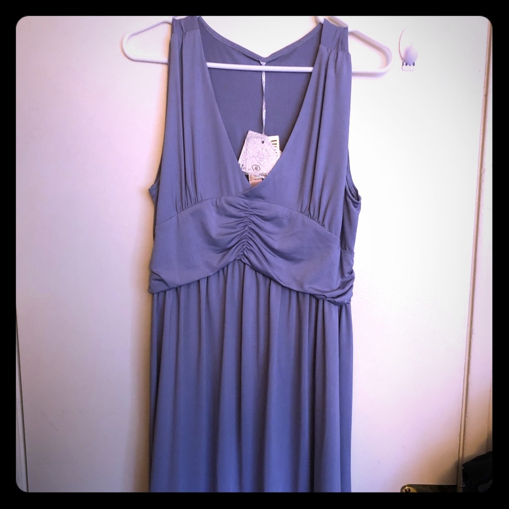 Sleeveless dress with ruching